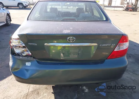 2002 Toyota Camry Xle z USA, uszkodzony, nr VIN 4T1BE32K82U519444